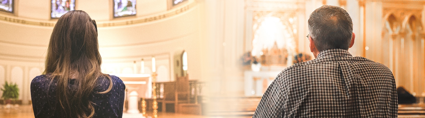 A woman and a man praying in adoration